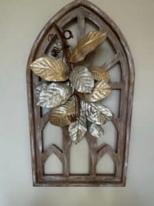 Distressed-Wood-Gothic-Arch-Wall-Decor-with-Faux-Leaf-Embellishment