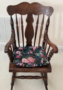 Antique-Oak-Press-Back-Rocking-Chair-with-Floral-Cushion
