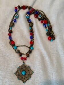 Bohemian-Style-Beaded-Necklace-with-Medallion-Pendant-and-Enamel-Charms
