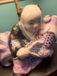 Chinese-Famille-Rose-Porcelain-Figurine-of-a-Boy-with-Koi-Fish-second-image