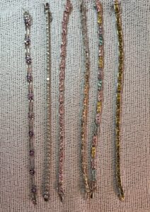 Collection-of-Six-Sterling-Silver-Tennis-Bracelets-with-Mixed-Gemstones