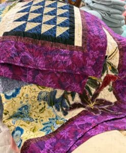 Handmade-Quilt-with-Geometric-and-Floral-Patterns