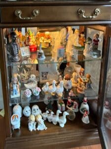 Jasper-Cabinet-Company-Model-Olde-Frtwd-Display-Hutch-with-Assorted-Figurines-third-image