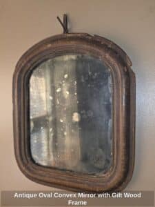 Antique-Oval-Convex-Mirror-with-Gilt-Wood-Frame-second-image