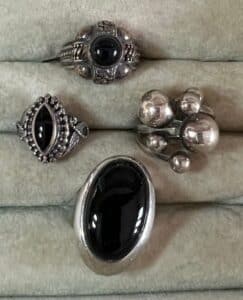 Set-of-Four-Sterling-Silver-and-Onyx-Rings-including-Mexican-Silver