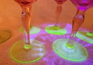 Set-of-Pink-Depression-Glass-Watermelon-Coupe-Glasses-with-Uranium-Green-Bases-second-image