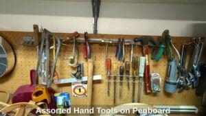 Assorted-Hand-Tools-on-Pegboard-second-image