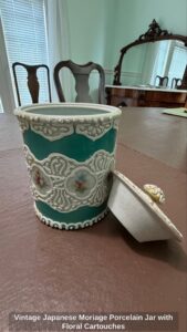 Vintage-Japanese-Moriage-Porcelain-Jar-with-Floral-Cartouches-second-image