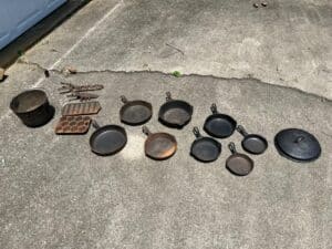 Variety-of-cast-iron-skillets-cornbred-muffin-pot-and-lid-items
