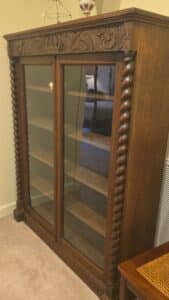 Antique-Oak-Display-Cabinet-with-Barley-Twist-Columns-and-Carved-Frieze