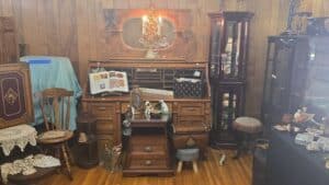 Antique-Oak-Roll-Top-Desk-with-Mirror-and-Chandelier