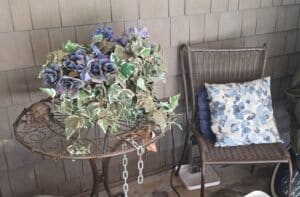 Artificial-Floral-Arrangement-with-Turtle-Motif-Wrought-Iron-Table