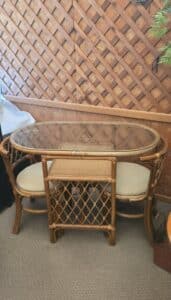 Pair-of-Vintage-Rattan-and-Cane-Barrel-Back-Armchairs-with-Round-Rattan-Side-Table-second-image