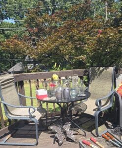 Piece-Wrought-Iron-Patio-Set-with-Glass-Table-and-Assorted-Glassware