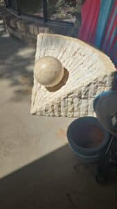 Travertine-Sphere-and-Pedestal-Sculpture