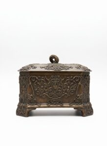 Assortment-of-Decorative-Home-Accents-including-Ornate-Boxes-Brass-Cannon-Figurine-Mosaic-Candle-Holder-Glass-Candlesticks-and-Finished-Vase