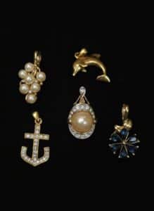Collection-of-Five-Vintage-Costume-Jewelry-Pendants-Anchor-Dolphin-Flower-Pearl-Cluster-and-Oval-Pearl-1