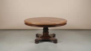 Traditional-Round-Pedestal-Dining-Table-with-Tufted-Leather-Chairs
