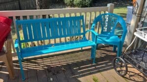 Turquoise-Metal-Garden-Bench-and-Blue-Plastic-Lattice-Back-Chair