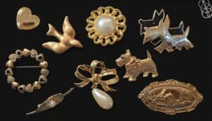 Assorted-Vintage-Costume-Jewelry-Brooches-Figural-Dog-Bird-Bow-and-Scenic-Motifs