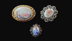 Collection-of-Three-Vintage-Porcelain-Brooches-Portrait-Rose-and-Courting-Scene