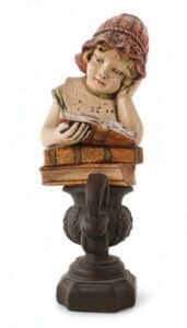 Vintage-Chalkware-Figurine-of-a-Girl-Reading-on-Books