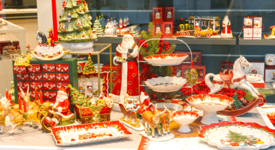 This shows a table of different Christmas decorations like plates and Santa.