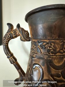 Vintage-Decorative-Pitcher-with-Dragon-Handle-and-Fish-Spout-second-image