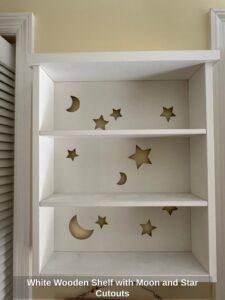 White-Wooden-Shelf-with-Moon-and-Star-Cutouts