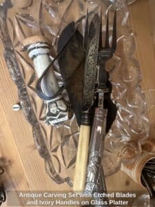 Antique-Carving-Set-with-Etched-Blades-and-Ivory-Handles-on-Glass-Platter