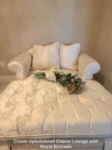 Cream-Upholstered-Chaise-Lounge-with-Floral-Brocade