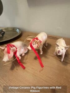 Vintage-Ceramic-Pig-Figurines-with-Red-Ribbon