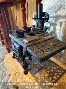 Vintage-Crescent-Cast-Iron-Toy-Stove-with-Accessories-third-image-1