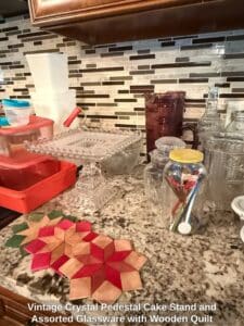 Vintage-Crystal-Pedestal-Cake-Stand-and-Assorted-Glassware-with-Wooden-Quilt-Coasters-1