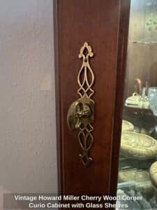 Vintage-Howard-Miller-Cherry-Wood-Corner-Curio-Cabinet-with-Glass-Shelves-second-image-1