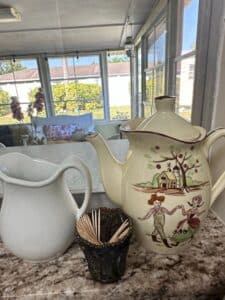 Assorted-Ceramic-Pitchers-and-Folk-Art-Teapot