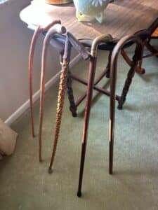 Collection-of-Four-Walking-Canes-including-a-Brass-Duck-Head-Cane