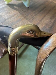 Collection-of-Four-Walking-Canes-including-a-Brass-Duck-Head-Cane-second-image