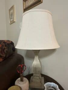 Distressed-Wood-Urn-Table-Lamp-with-Neutral-Drum-Shade