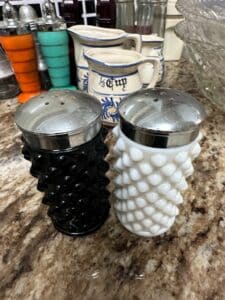 Fenton-Hobnail-Milk-Glass-and-Black-Glass-Salt-and-Pepper-Shakers