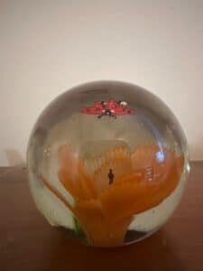 Glass-Paperweight-with-Embedded-Ladybug-and-Flower
