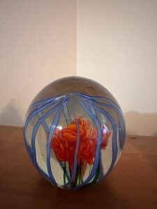 Glass-Paperweight-with-Red-Flower-and-Blue-Swirls