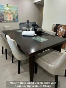 Modern-Dark-Wood-Dining-Table-with-Corduroy-Upholstered-Chairs