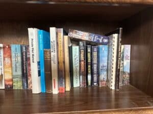 Oak-Bookshelf-with-Assorted-Books-and-Artwork-fifth-image