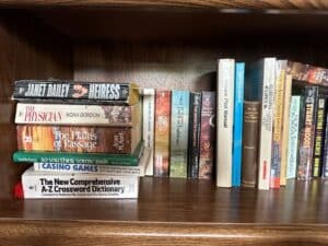 Oak-Bookshelf-with-Assorted-Books-and-Artwork-fourth-image