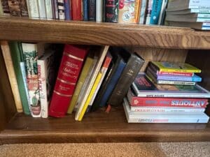 Oak-Bookshelf-with-Assorted-Books-and-Artwork-second-image