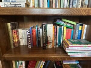 Oak-Bookshelf-with-Assorted-Books-and-Artwork-third-image