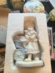 Porcelain-Figurine-of-a-Girl-with-a-Cat-and-Basket