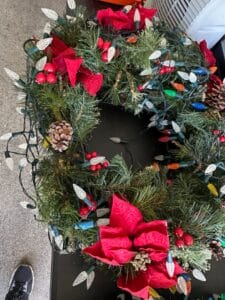 Pre-lit-Artificial-Christmas-Wreath-with-Poinsettias-Berries-and-Pinecones