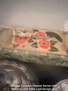 Vintage-Ceramic-Cheese-Server-with-Hibiscus-and-Palm-Leaf-Design-and-Wooden-Handled-Knife